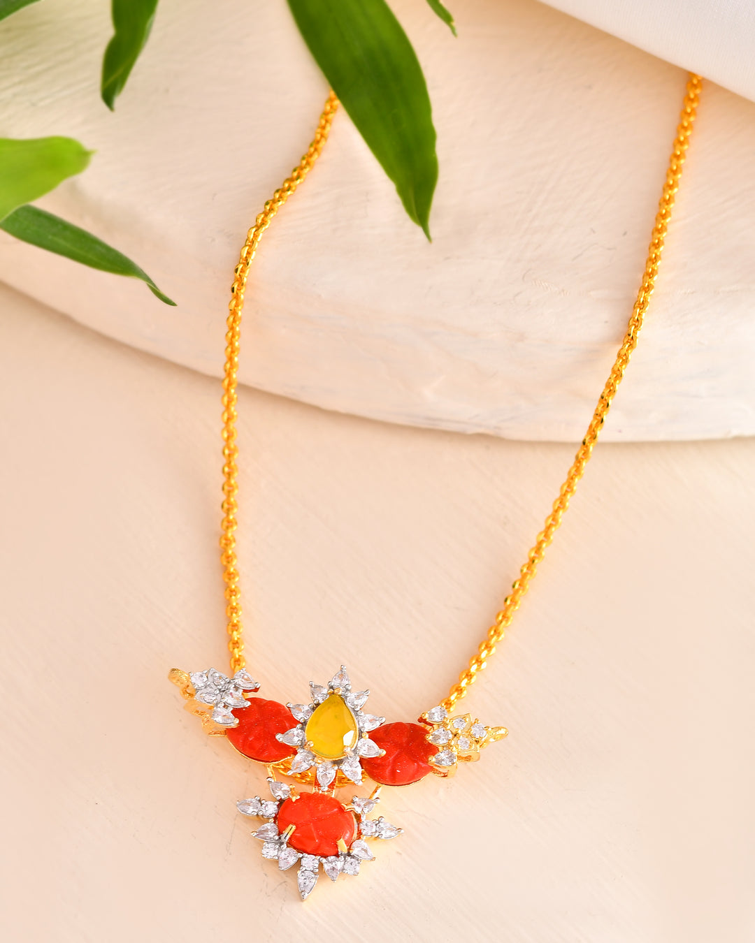 Radiant Floral Pendant Necklace with Orange Accents