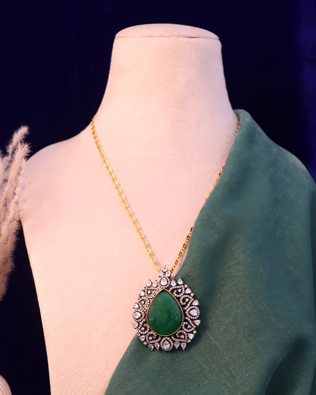 Emerald Green Stone Set on Dusty Teal Velvet