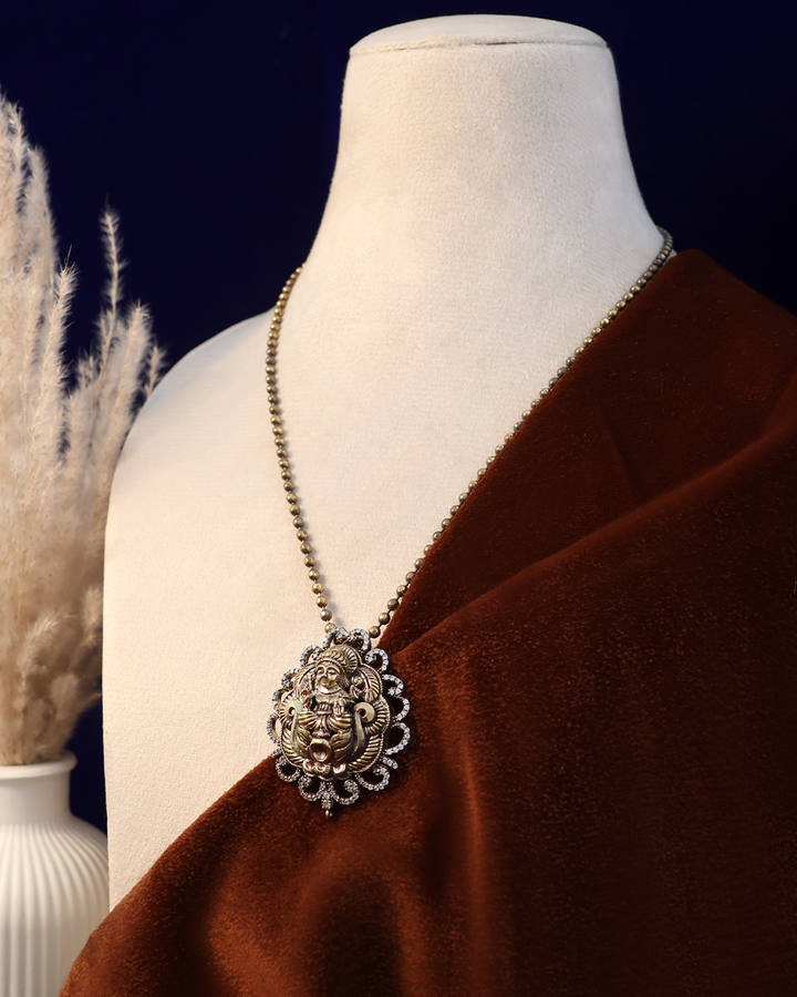 Antique Gold Goddess Necklace on Ox Brown Velvet