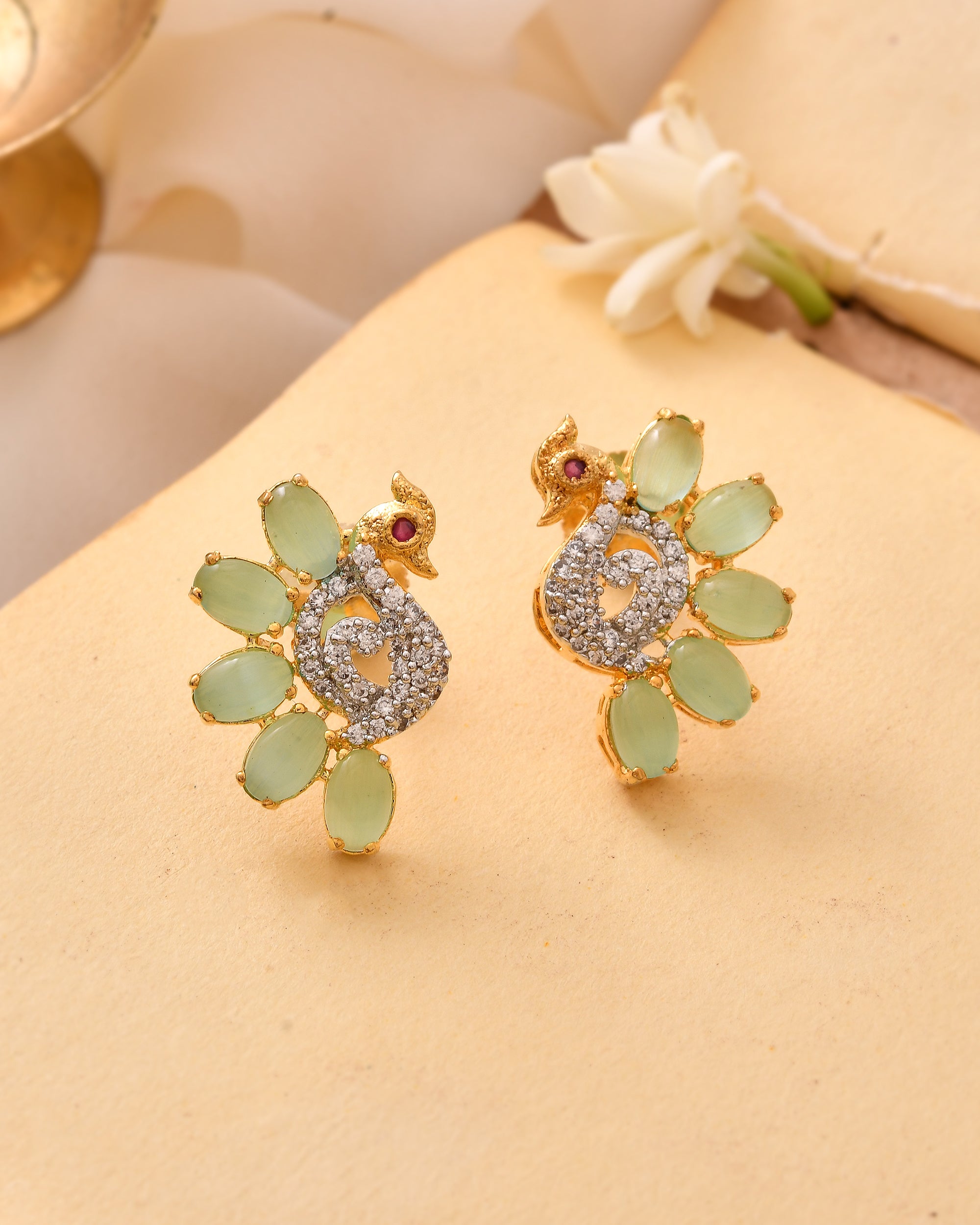 The Mayur Panna Crest Earrings