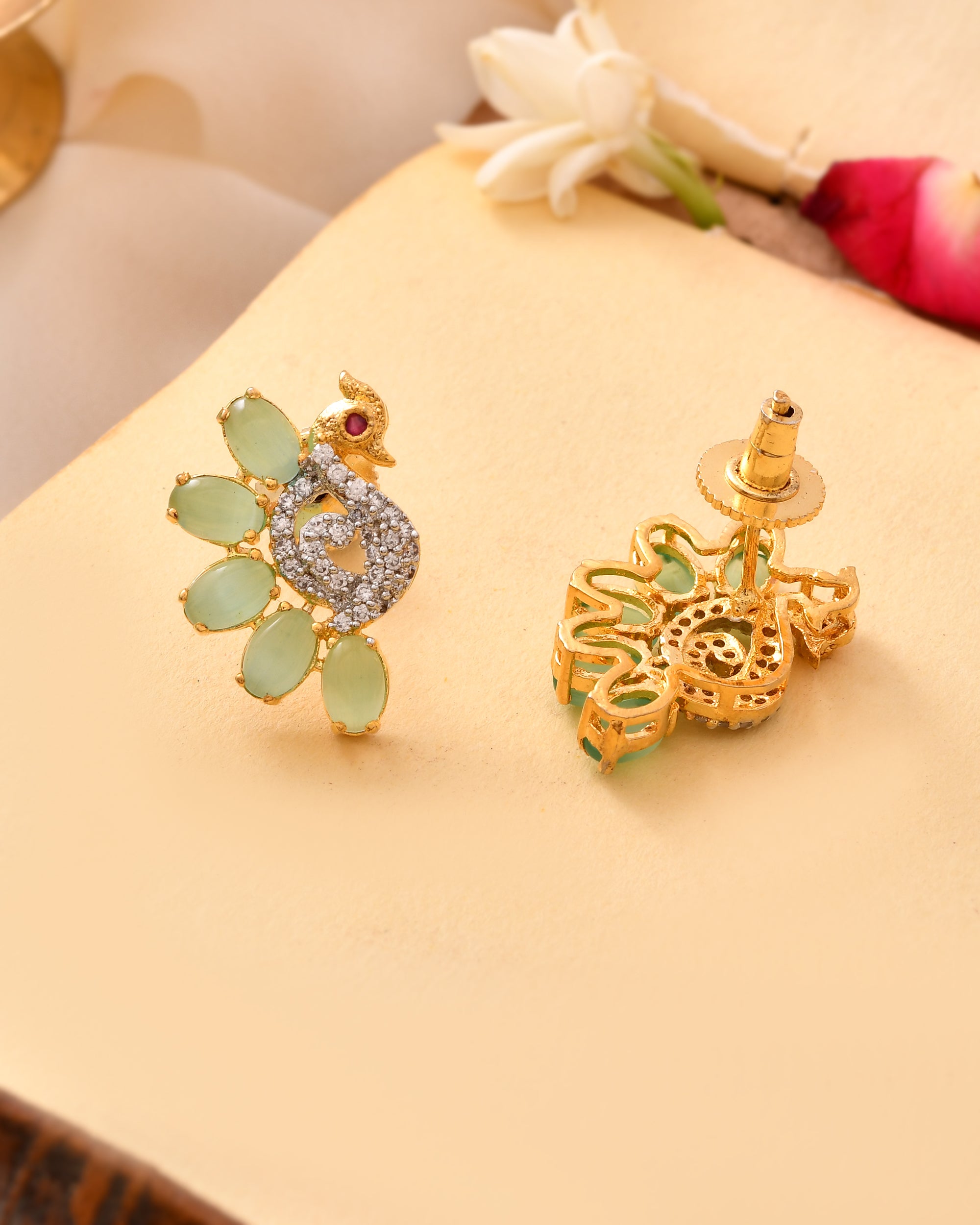 The Mayur Panna Crest Earrings