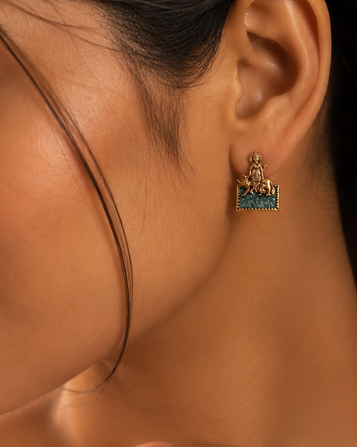 Krishna on Cow Studs with Carved Emerald Base