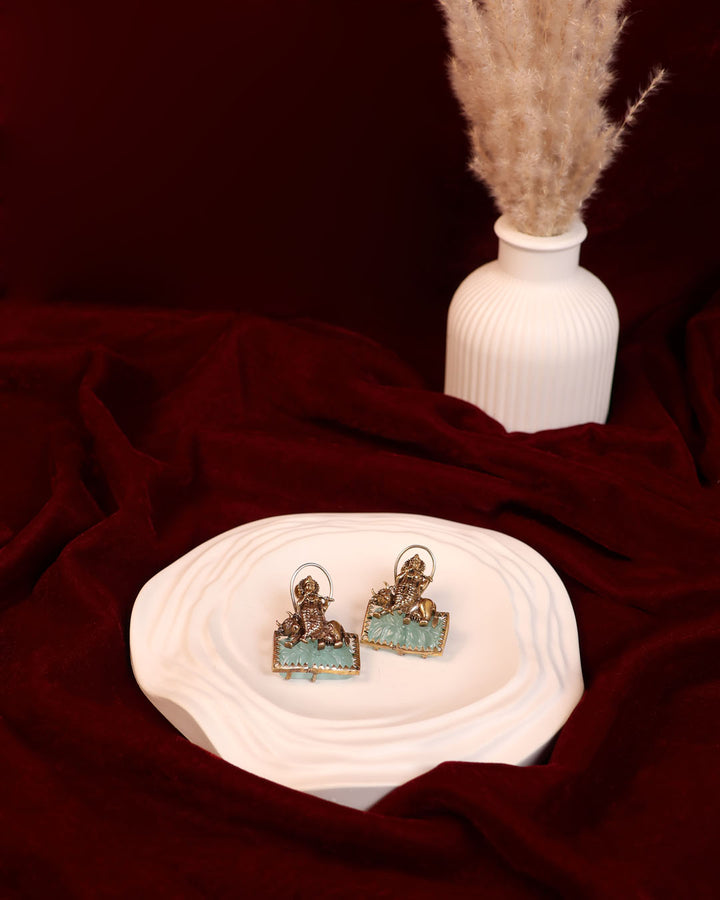 Krishna on Cow Studs with Carved Emerald Base