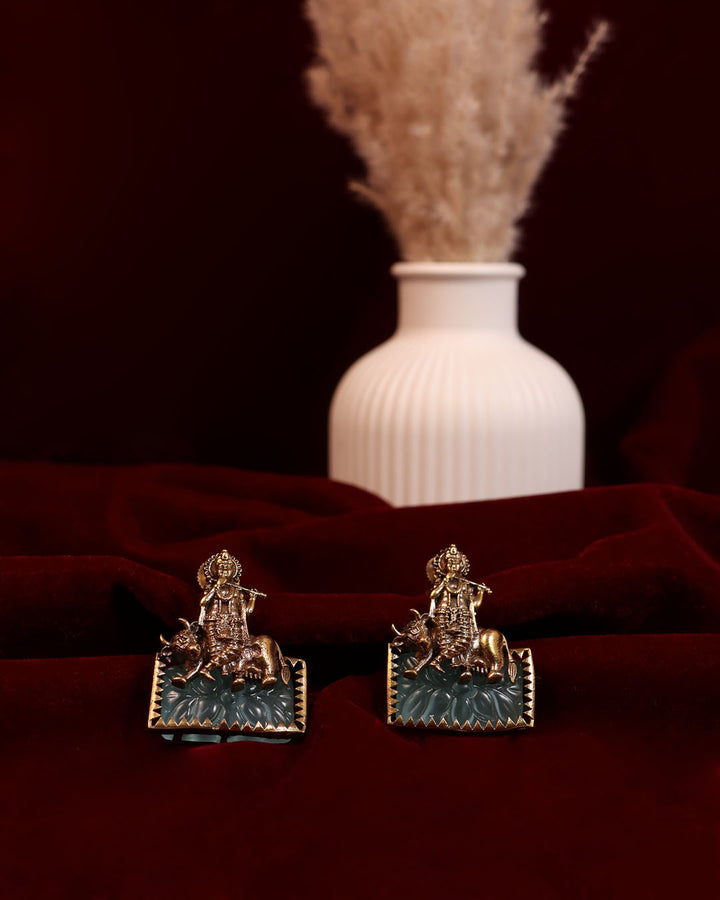 Krishna on Cow Studs with Carved Emerald Base