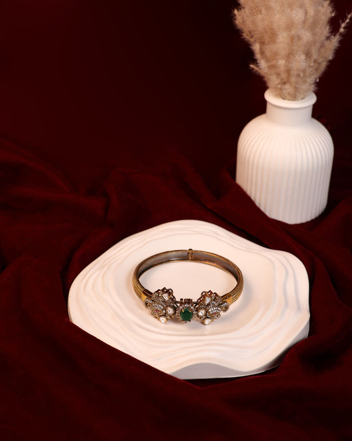 Antique Floral Kada with Emerald Centerpiece